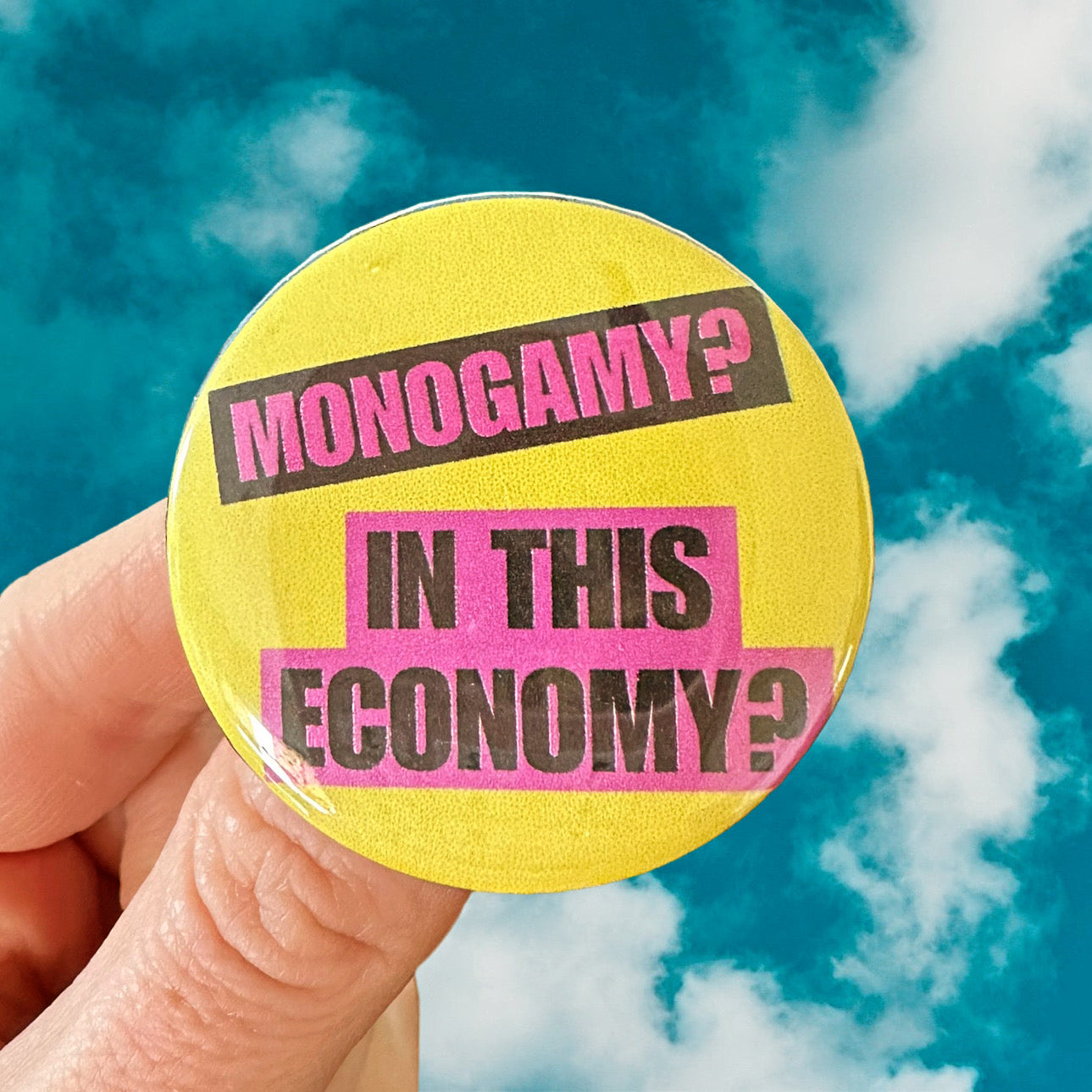 Yellow and Pink Button 1.75” “monogamy? In this economy?”