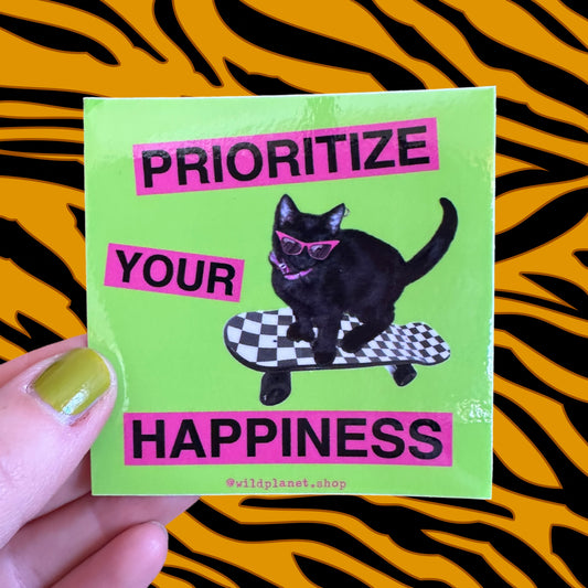 Sticker “prioritize your happiness” with cool skateboarding kitten green and pink 3” x 3”